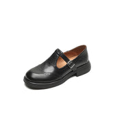 Damskie zimowe buty skórzane z paskiem w kształcie litery T - elegancki styl i komfort 2