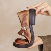 Damskie zimowe buty skórzane z paskiem w kształcie litery T - elegancki styl i komfort 5