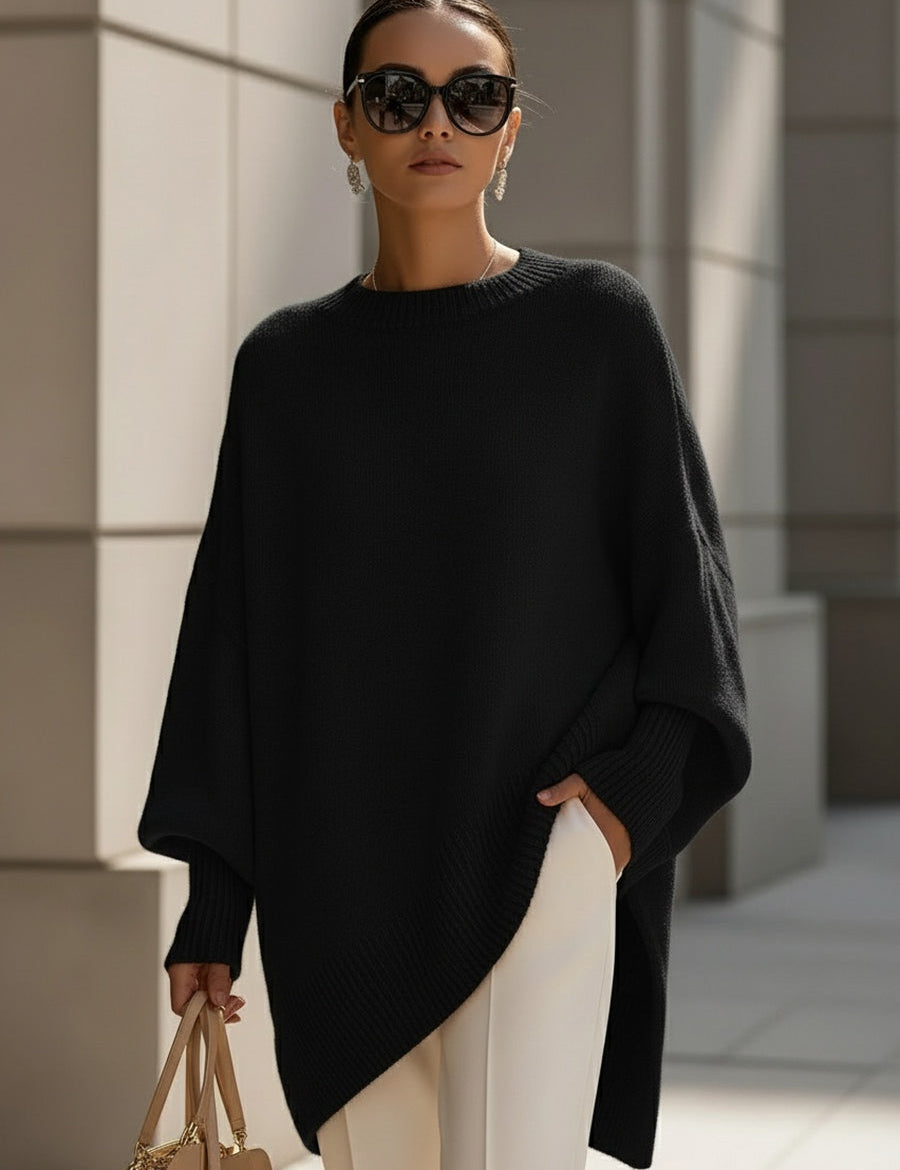 Oversize'owy sweter z asymetrycznym dołem dla kobiet 10