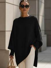 Oversize'owy sweter z asymetrycznym dołem dla kobiet 10
