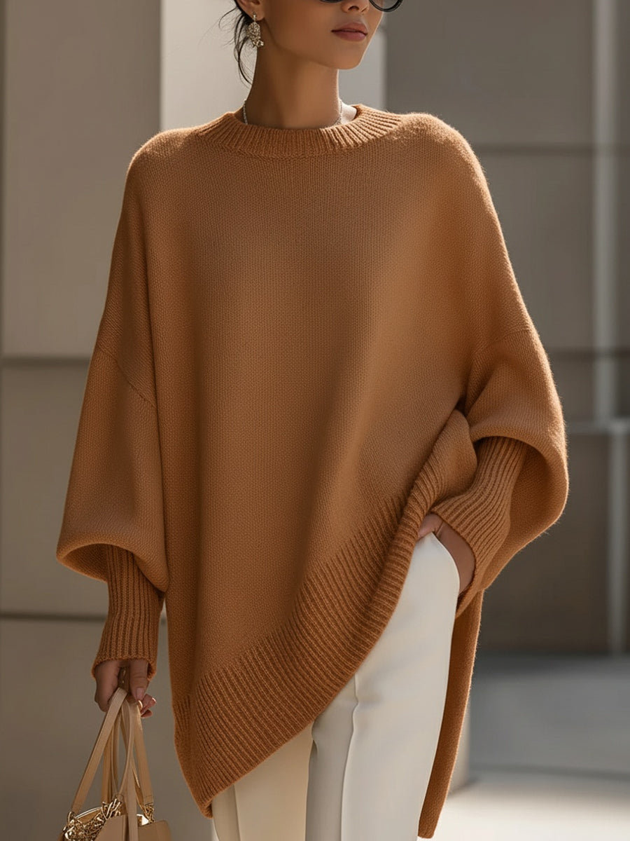 Oversize'owy sweter z asymetrycznym dołem dla kobiet 7